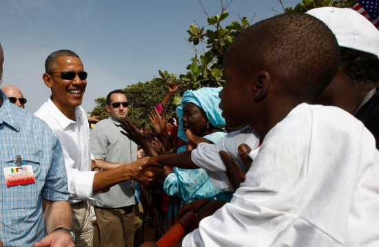 U.S. President Barack Obama greets well-wishers during his visit to Goree Island near Dakar