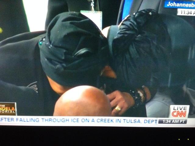 Winnie Mandela embracing Graca Machel.