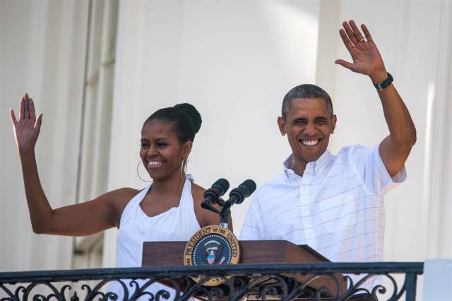 Barack & Michelle waves to veterans and their familes as they host Independence Day barbecue on the South Lawn of the White House