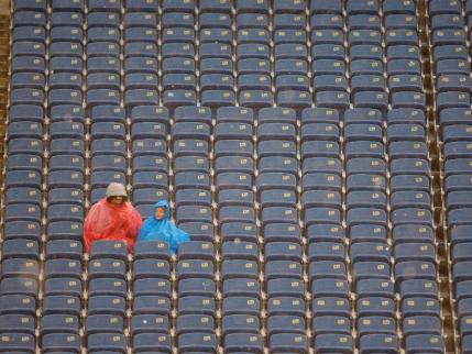 football-empty-stadium-seats-rain.jpg?w=